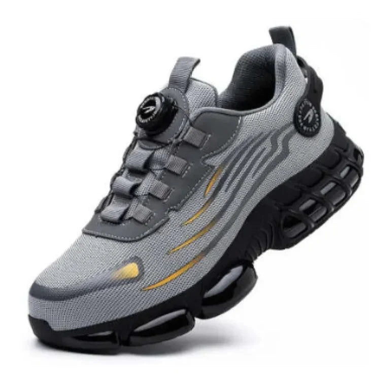 Grauer Sportschuh mit innovativer Sohle, atmungsaktivem Mesh-Obermaterial und modernem Design. Ideal für Laufen und Fitness.