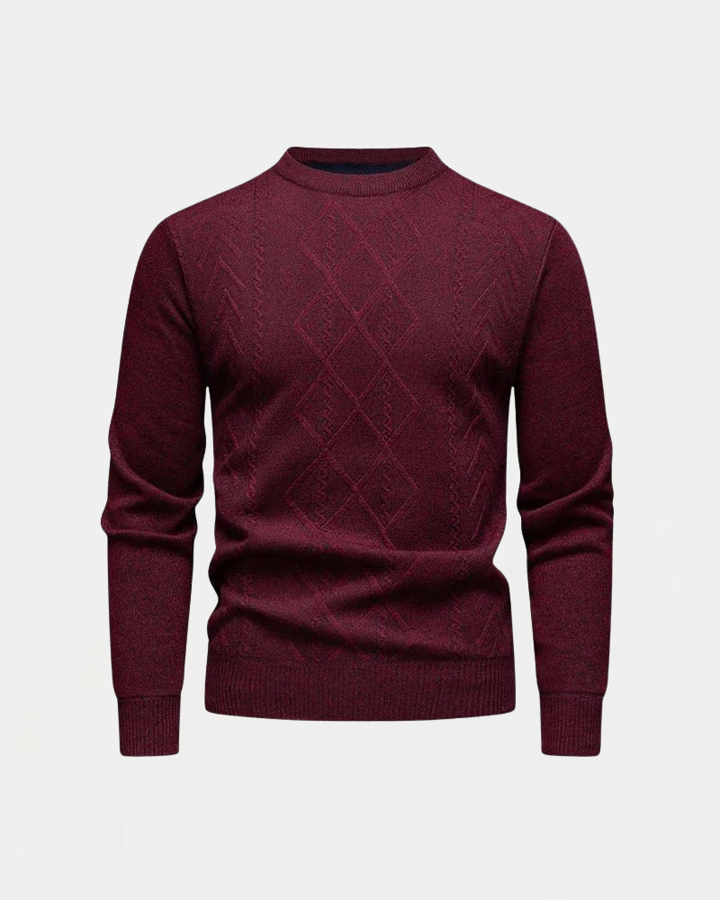 Bordeauxroter Herrenpullover mit Rautenmuster, Rundhalsausschnitt und langen Ärmeln. Eleganter Strickpullover für Herbst und Wintermode.