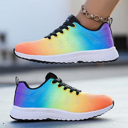 Bunte Laufschuhe mit Farbverlauf von Orange zu Blau, weiße Sohle, schwarzer Schnürsenkel. Modische Sportschuhe für Damen. Ideal für Fitness und Freizeit.