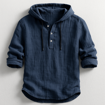 Dunkelblaues Leinen-Hemd mit Kapuze, Knopfleiste und hochgekrempelten Ärmeln. Stilvolle Herrenmode, ideal für lässige Outfits.