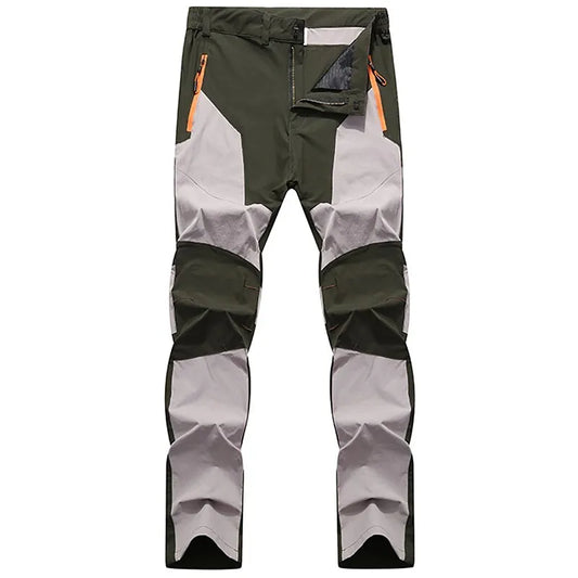 Grüne und graue Outdoor-Hose mit Reißverschlusstaschen, strapazierfähigem Material, ideal für Wandern und Trekking. Herrenbekleidung, funktional.