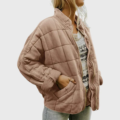 Damen Winterjacke in Rosa, gesteppt, mit Reißverschluss und Taschen. Modische, warme Jacke für kalte Tage. Ideal für Herbst und Winter.
