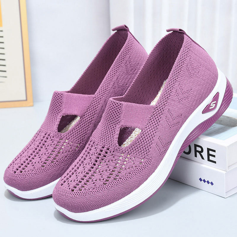 Lila Damen-Sneaker mit atmungsaktivem Strick-Obermaterial, rutschfester Sohle und modernem Design. Bequeme Freizeitschuhe für Alltag und Sport.