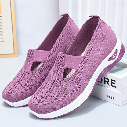 Lila Damen-Sneaker mit atmungsaktivem Strick-Obermaterial, rutschfester Sohle und modernem Design. Bequeme Freizeitschuhe für Alltag und Sport.