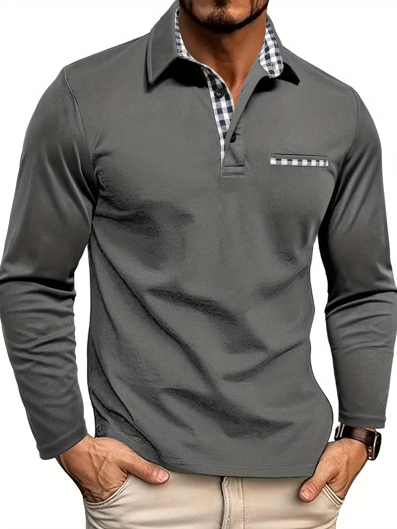 Graues Herren-Poloshirt mit langen Ärmeln und kariertem Kragen. Modisches Design, ideal für Freizeit und Büro. Hochwertige Herrenmode.