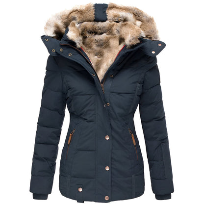 Damen Winterjacke mit Kapuze, Kunstfellbesatz, dunkelblau, gesteppte Optik, Reißverschlusstaschen, warm gefüttert, modisch und funktional.