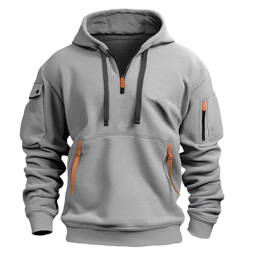 Grauer Herren-Hoodie mit Kapuze, Reißverschlusstaschen und orangefarbenen Akzenten. Bequeme Freizeitmode, ideal für Herbst und Winter.