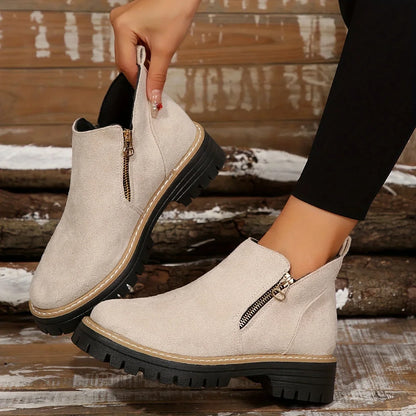 Damen-Stiefeletten aus Leoparden-Wildleder mit seitlichem Reißverschluss und klobiger Profilsohle