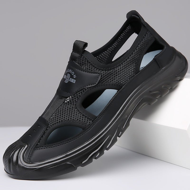 Schwarze Herren-Sandale mit atmungsaktivem Mesh-Design, rutschfester Sohle und modernem Look. Ideal für Sommer und Outdoor-Aktivitäten.