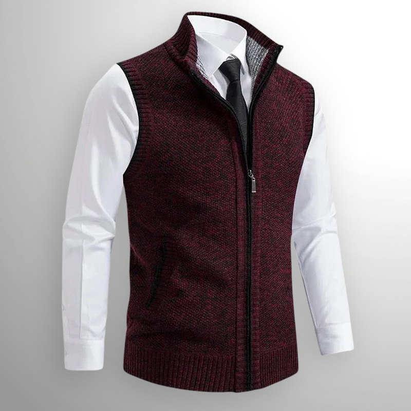 Bordeauxrote Strickweste mit Reißverschluss über weißem Hemd und schwarzer Krawatte, elegante Herrenmode, stilvoller Business-Look.